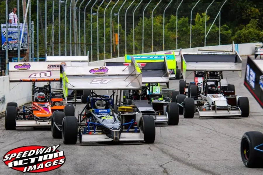 Supermodifieds lined up on the front stretch